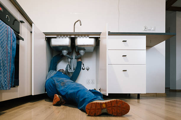 Professional Drain Cleaning technician working in Kennard, TX